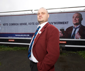 The Pub Landlord v Nigel Farage: The Battle For South Thanet. The Pub Landlord (Al Murray). Copyright: Liberty Bell