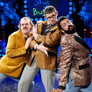 The Angelos Epithemiou Show. Image shows from L to R: Kenny (Seymour Mace), Angelos Epithemiou (Dan Skinner), Gupta (Adeel Akhtar). Copyright: Pett Productions