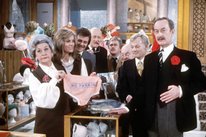 Are You Being Served?. Image shows from L to R: Mrs. Betty Slocombe (Mollie Sugden), Miss Shirley Brahms (Wendy Richard), Mr. Dick Lucas (Trevor Bannister), Mr. Cuthbert Rumbold (Nicholas Smith), Mr. Mash (Larry Martyn), Mr. Ernest Grainger (Arthur Brough), Mr. Wilberforce Humphries (John Inman), Captain Stephen Peacock (Frank Thornton). Copyright: BBC