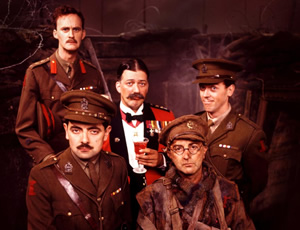 Blackadder. Image shows from L to R: Captain Kevin Darling (Tim McInnerny), Captain Edmund Blackadder (Rowan Atkinson), General Melchett (Stephen Fry), Baldrick (Tony Robinson), Lieutenant George Barleigh (Hugh Laurie). Copyright: BBC / Tiger Aspect Productions