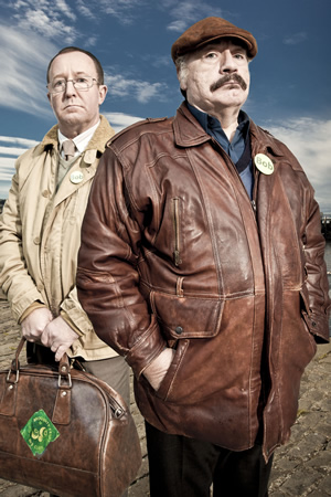 Bob Servant. Image shows from L to R: Frank (Jonathan Watson), Bob Servant (Brian Cox). Copyright: BBC