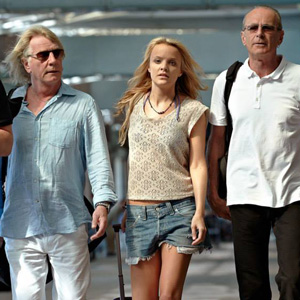 Bula Quo!. Image shows from L to R: Rick (Rick Parfitt), Caroline (Laura Aikman), Francis (Francis Rossi). Copyright: Status Quo Films