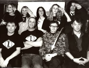 Cluub Zarathustra. Image shows from L to R: Kevin Eldon, Roger Mann, Lori Lixenberg, Sally Phillips, Simon Munnery, Richard Thomas, Stewart Lee