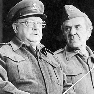 Dad's Army. Image shows from L to R: Captain Mainwaring (Arthur Lowe), Sergeant Wilson (John Le Mesurier). Copyright: BBC