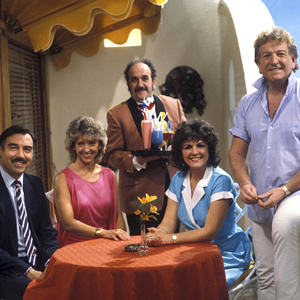 Duty Free. Image shows from L to R: Robert Cochran (Neil Stacy), Linda Cochran (Joanna Van Gyseghem), Carlos (Carlos Douglas), Amy Pearce (Gwen Taylor), David Pearce (Keith Barron). Copyright: Yorkshire Television