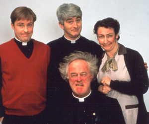 Father Ted. Image shows from L to R: Father Dougal McGuire (Ardal O'Hanlon), Father Ted Crilly (Dermot Morgan), Father Jack Hackett (Frank Kelly), Mrs Doyle (Pauline McLynn). Copyright: Hat Trick Productions