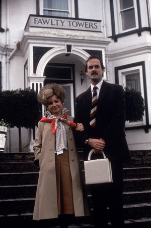 Fawlty Towers. Image shows from L to R: Sybil Fawlty (Prunella Scales), Basil Fawlty (John Cleese). Copyright: BBC