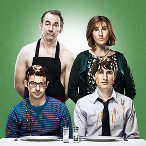 Friday Night Dinner. Image shows from L to R: Martin (Paul Ritter), Adam (Simon Bird), Jackie (Tamsin Greig), Jonny (Tom Rosenthal). Copyright: Popper Pictures / Big Talk Productions