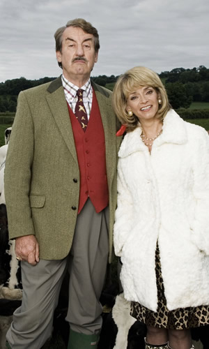 The Green Green Grass. Image shows from L to R: Boycie (John Challis), Marlene Boyce (Sue Holderness). Copyright: Shazam Productions