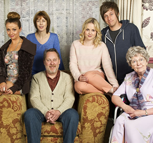 Hebburn. Image shows from L to R: Vicki (Lisa McGrillis), Pauline Pearson (Gina McKee), Joe Pearson (Vic Reeves), Sarah Pearson (Kimberley Nixon), Jack Pearson (Chris Ramsey), Dot (Pat Dunn). Copyright: Channel X North / Baby Cow Productions