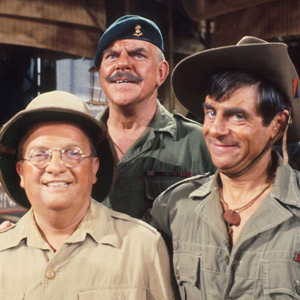 It Ain't Half Hot Mum. Image shows from L to R: Gunner 'Lofty' Sugden (Don Estelle), BSM Geoffrey 'Shut Up' Williams (Windsor Davies), Bombardier 'Gloria' Beaumont (Melvyn Hayes). Copyright: BBC