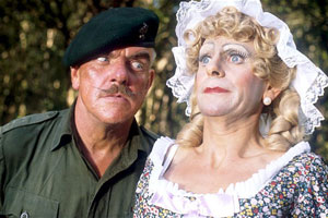 It Ain't Half Hot Mum. Image shows from L to R: BSM Geoffrey 'Shut Up' Williams (Windsor Davies), Bombardier 'Gloria' Beaumont (Melvyn Hayes). Copyright: BBC