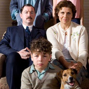 Just William. Image shows from L to R: Mr Brown (Daniel Ryan), William Brown (Daniel Roche), Mrs Brown (Rebecca Front). Copyright: BBC