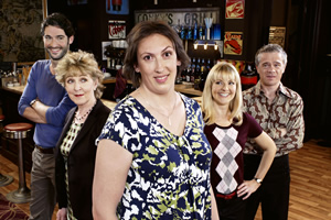 Miranda. Image shows from L to R: Gary (Tom Ellis), Penny (Patricia Hodge), Miranda (Miranda Hart), Stevie (Sarah Hadland), Clive (James Holmes). Copyright: BBC