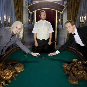 That Mitchell And Webb Look. Image shows from L to R: David Mitchell, Croupier (John Finnemore), Robert Webb. Copyright: BBC