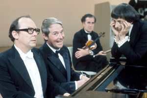 The Morecambe & Wise Show. Image shows from L to R: Eric Morecambe, Ernie Wise, Andre Previn. Copyright: BBC