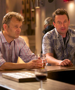 Not Going Out. Image shows from L to R: Toby (Hugh Dennis), Lee (Lee Mack). Copyright: Avalon Television / Arlo Productions