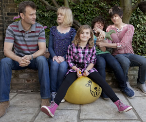 Outnumbered. Image shows from L to R: Pete (Hugh Dennis), Sue (Claire Skinner), Karen (Ramona Marquez), Ben (Daniel Roche), Jake (Tyger Drew-Honey). Copyright: Hat Trick Productions