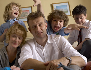 Outnumbered. Image shows from L to R: Karen (Ramona Marquez), Sue (Claire Skinner), Pete (Hugh Dennis), Ben (Daniel Roche), Jake (Tyger Drew-Honey). Copyright: Hat Trick Productions