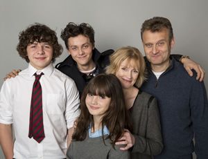 Outnumbered. Image shows from L to R: Ben (Daniel Roche), Jake (Tyger Drew-Honey), Karen (Ramona Marquez), Sue (Claire Skinner), Pete (Hugh Dennis). Copyright: Hat Trick Productions