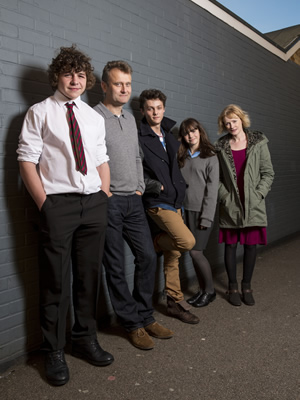 Outnumbered. Image shows from L to R: Ben (Daniel Roche), Pete (Hugh Dennis), Jake (Tyger Drew-Honey), Karen (Ramona Marquez), Sue (Claire Skinner). Copyright: Hat Trick Productions