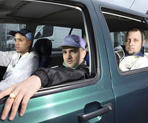 People Just Do Nothing. Image shows from L to R: Decoy (Daniel Sylvester Woolford), Grindah (Allan Mustafa), Beats (Hugo Chegwin). Copyright: Roughcut Television