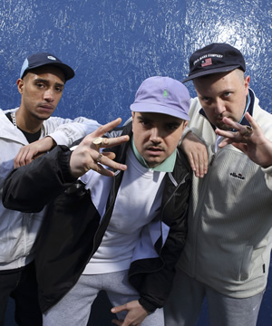 People Just Do Nothing. Image shows from L to R: Decoy (Daniel Sylvester Woolford), Grindah (Allan Mustafa), Beats (Hugo Chegwin). Copyright: Roughcut Television