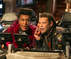 Red Dwarf. Image shows from L to R: Cat (Danny John-Jules), Lister (Craig Charles). Copyright: Grant Naylor Productions / BBC