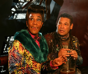 Red Dwarf. Image shows from L to R: Cat (Danny John-Jules), Lister (Craig Charles). Copyright: Grant Naylor Productions / BBC