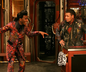 Red Dwarf. Image shows from L to R: Cat (Danny John-Jules), Lister (Craig Charles). Copyright: Grant Naylor Productions / BBC