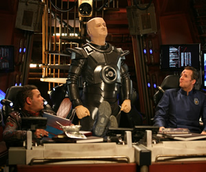 Red Dwarf. Image shows from L to R: Lister (Craig Charles), Kryten (Robert Llewellyn), Rimmer (Chris Barrie). Copyright: Grant Naylor Productions / BBC