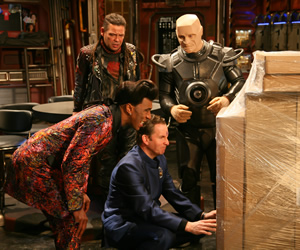 Red Dwarf. Image shows from L to R: Lister (Craig Charles), Cat (Danny John-Jules), Rimmer (Chris Barrie), Kryten (Robert Llewellyn). Copyright: Grant Naylor Productions / BBC