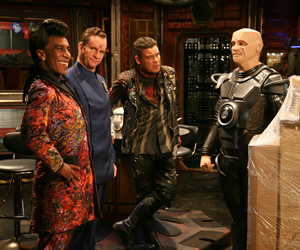 Red Dwarf. Image shows from L to R: Cat (Danny John-Jules), Rimmer (Chris Barrie), Lister (Craig Charles), Kryten (Robert Llewellyn). Copyright: Grant Naylor Productions / BBC