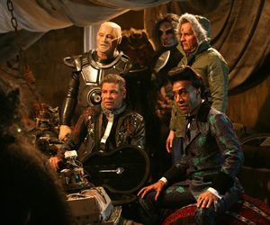 Red Dwarf. Image shows from L to R: Kryten (Robert Llewellyn), Lister (Craig Charles), Rimmer (Chris Barrie), Cat (Danny John-Jules). Copyright: Grant Naylor Productions / BBC