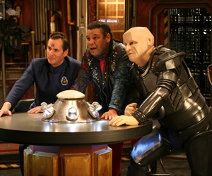 Red Dwarf. Image shows from L to R: Rimmer (Chris Barrie), Lister (Craig Charles), Kryten (Robert Llewellyn). Copyright: Grant Naylor Productions / BBC