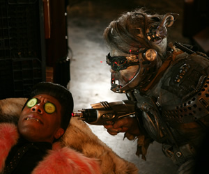 Red Dwarf. Image shows from L to R: Cat (Danny John-Jules), Hogey the Roguey (Richard O'Callaghan). Copyright: Grant Naylor Productions / BBC