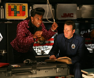 Red Dwarf. Image shows from L to R: Cat (Danny John-Jules), Rimmer (Chris Barrie). Copyright: Grant Naylor Productions / BBC