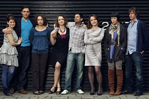 Reunited. Image shows from L to R: Sophie (Jemima Rooper), Martin (Joseph Millson), Sarah (Michelle Terry), Belinda (Emma Stansfield), Danny (Navin Chowdhry), Hannah (Zoe Tapper), Fran (Sarah Jane Potts), Ed (Ed Byrne). Copyright: BBC