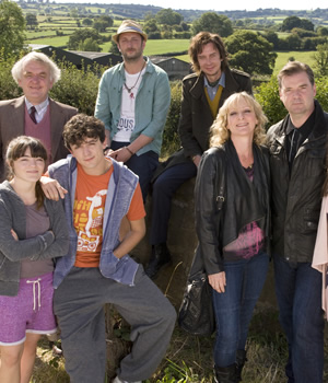 Starlings. Image shows from L to R: Grandad (Alan Williams), Charlie (Finn Atkins), Gravy (John Dagleish), Fergie (Steve Edge), Uncle Loz (Matt King), Jan (Lesley Sharp), Terry (Brendan Coyle). Copyright: Baby Cow Productions