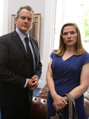 Twenty Twelve. Image shows from L to R: Ian Fletcher (Hugh Bonneville), Siobhan Sharpe (Jessica Hynes). Copyright: BBC