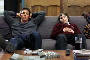 About A Boy. Image shows from L to R: Will Freeman (Hugh Grant), Marcus (Nicholas Hoult)