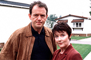 Auf Wiedersehen, Pet. Image shows left to right: Neville (Kevin Whately), Brenda Hope (Julia Tobin)
