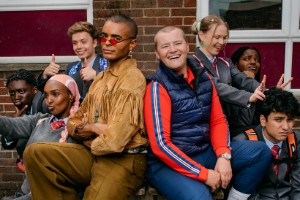 Bad Education. Image shows left to right: Inchez (Anthony J Abraham), Usma (Asha Hassan), Harrison (Bobby Johnson), Stephen (Layton Williams), Mitchell (Charlie Wernham), Jinx (Laura Marcus), Blessing (Francesca Amewudah-Rivers), Warren (Ali Hadji-Heshmati). Credit: Matt Crockett