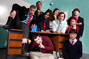 Bad Education. Image shows left to right: Mitchell (Charlie Wernham), Stephen Carmichael (Layton Williams), Alfie (Jack Whitehall), Chantelle (Nikki Runeckles), Miss Gulliver (Sarah Solemani), Fraser (Mathew Horne), Joe (Ethan Lawrence), Rem Dogg (Jack Binstead), Jing (Kae Alexander). Credit: Tiger Aspect Productions