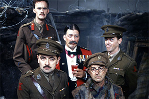 Blackadder. Image shows left to right: Captain Kevin Darling (Tim McInnerny), Captain Edmund Blackadder (Rowan Atkinson), General Melchett (Stephen Fry), Baldrick (Tony Robinson), Lieutenant George Barleigh (Hugh Laurie)