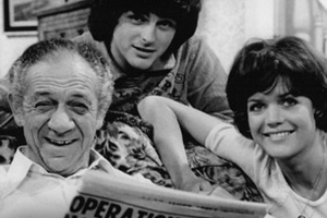 Bless This House. Image shows from L to R: Sid Abbott (Sid James), Mike Abbott (Robin Stewart), Sally Abbott (Sally Geeson)