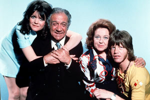 Bless This House. Image shows from L to R: Sally Abbot (Sally Geeson), Sid Abbot (Sid James), Jean Abbot (Diana Coupland), Mike Abbot (Robin Askwith)