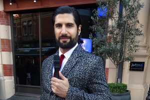 Britain Today Tonight. Mike Armenian (Kayvan Novak)