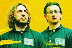 The Bystanders. Image shows left to right: Frank Baron (Seann Walsh), Peter Weir (Scott Haran)