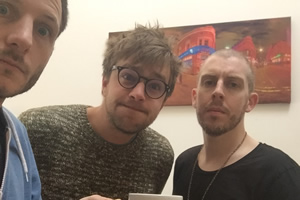 Image shows from L to R: Chris Martin, Iain Stirling, Carl Donnelly